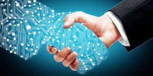 Businessman shaking digital partners hand on blue background